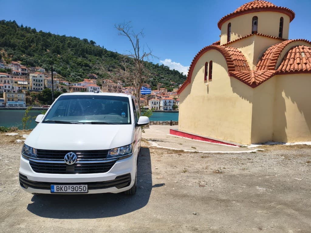 White Volkswagen Transporter T6 9-seat minivan for private transfers from Sparta