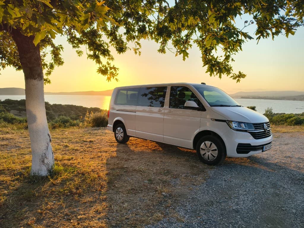 White Volkswagen Transporter T6 9-seat minivan for private transfers from Sparta