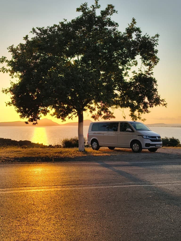 White Volkswagen Transporter T6 9-seat minivan for private transfers from Sparta