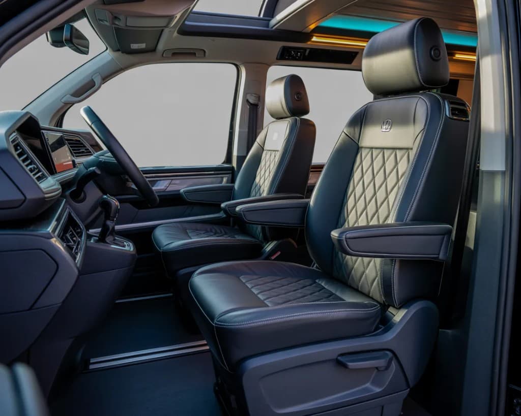 White Volkswagen Transporter T6 9-seat minivan for private transfers from Sparta